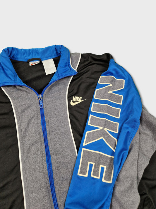 Vintage Nike Sportjacke Spellout Auf Dem Arm Blau Schwarz S-M